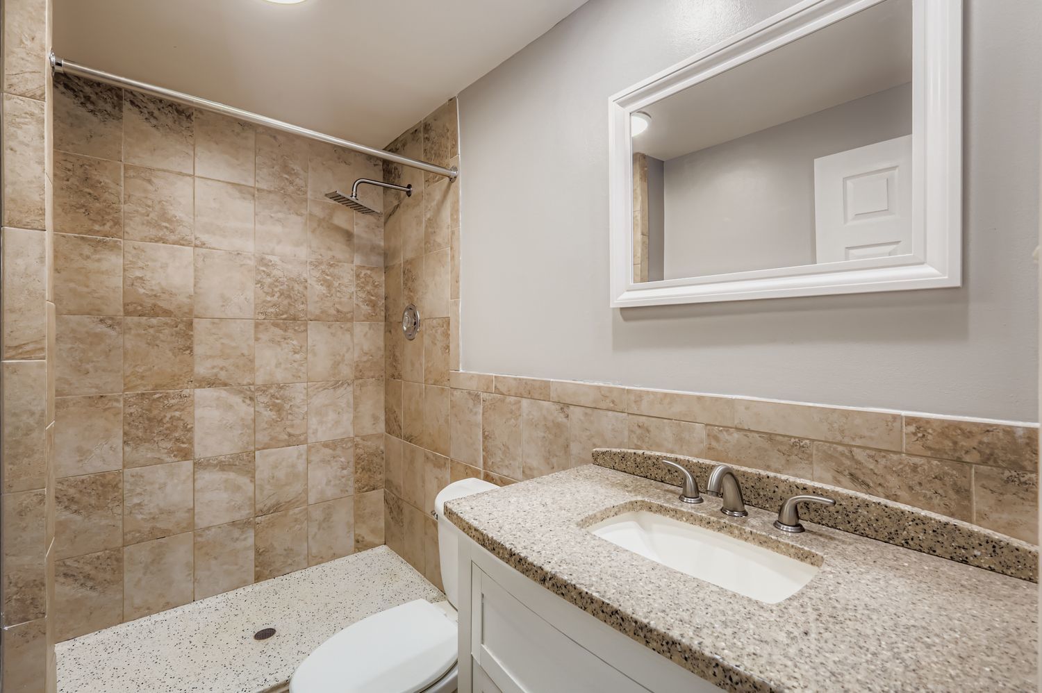 10048 South Pulaski Road, Unit 1E Oak Lawn, IL 60453 - Photo 14 of 27 a bathroom with a granite countertop sink toilet a mirror and shower