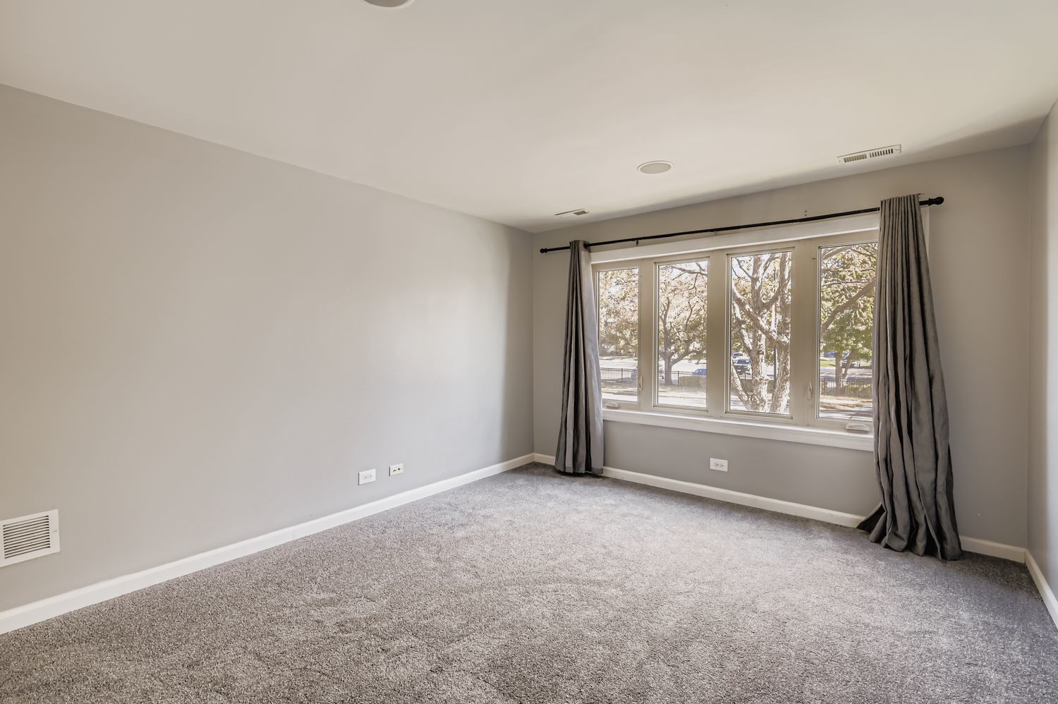 10048 South Pulaski Road, Unit 1E Oak Lawn, IL 60453 - Photo 17 of 27 a view of an empty room with a window