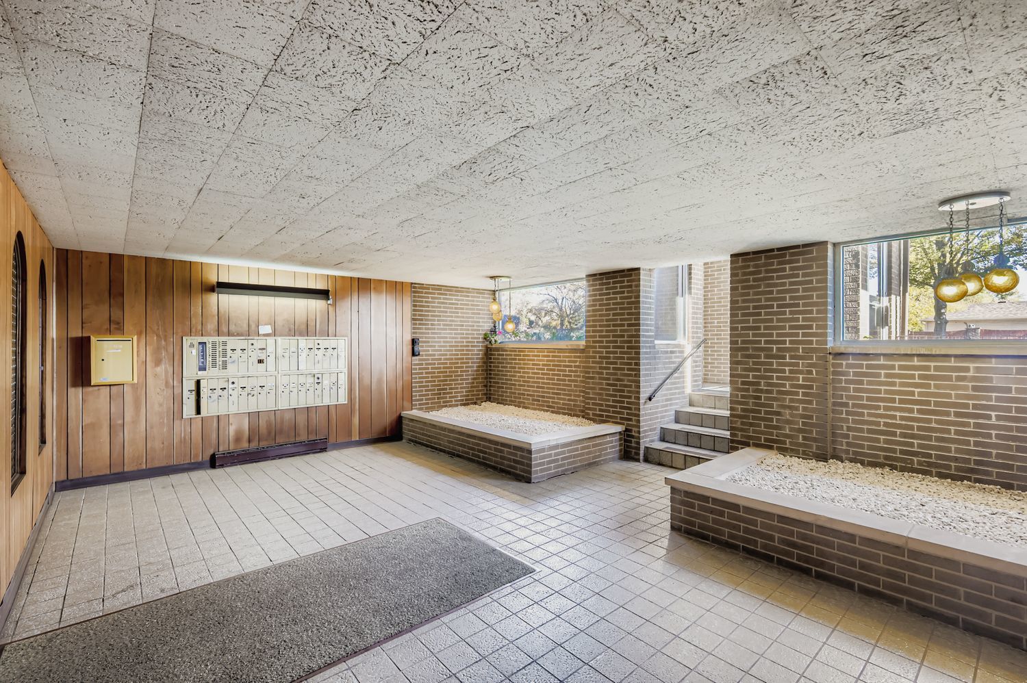 10048 South Pulaski Road, Unit 1E Oak Lawn, IL 60453 - Photo 23 of 27 a spacious bedroom with a bed and a couch