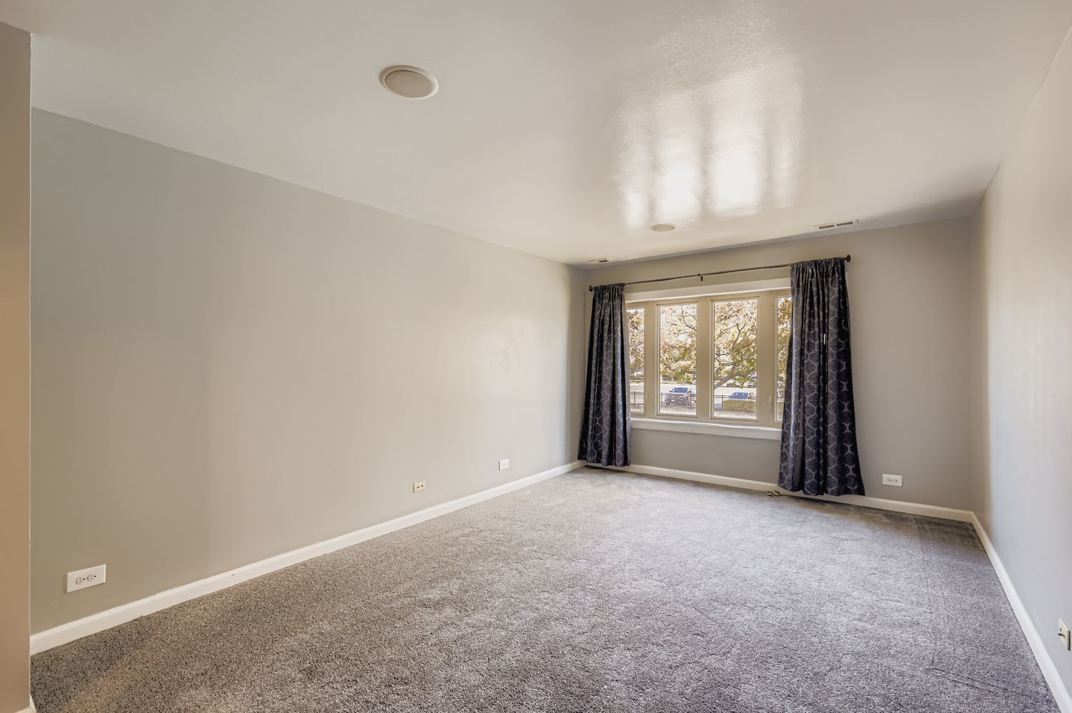 10048 South Pulaski Road, Unit 1E Oak Lawn, IL 60453 - Photo 10 of 27 a view of an empty room with a window