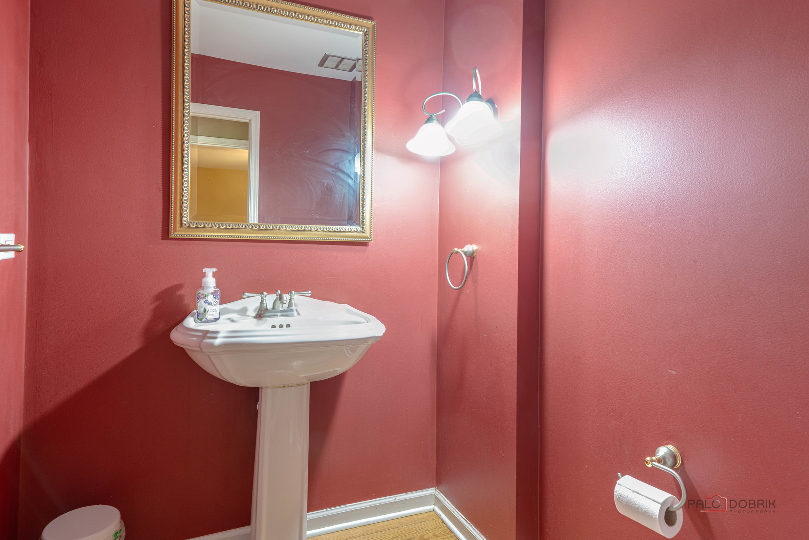 357 Roberts Road Inverness, IL 60010 - Photo 24 of 50 a bathroom with a sink and a mirror