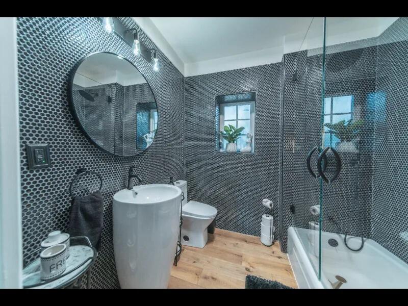 70 Eucalyptus Lane Santa Barbara, CA 93108 - Photo 11 of 47 a bathroom with a sink toilet and mirror