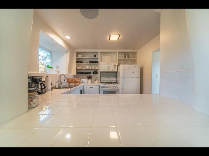 70 Eucalyptus Lane Santa Barbara, CA 93108 - Photo 14 of 47 a view of a kitchen with a sink