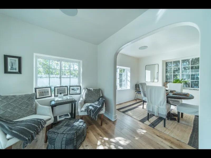 70 Eucalyptus Lane Santa Barbara, CA 93108 - Photo 19 of 47 a living room with furniture and a large window
