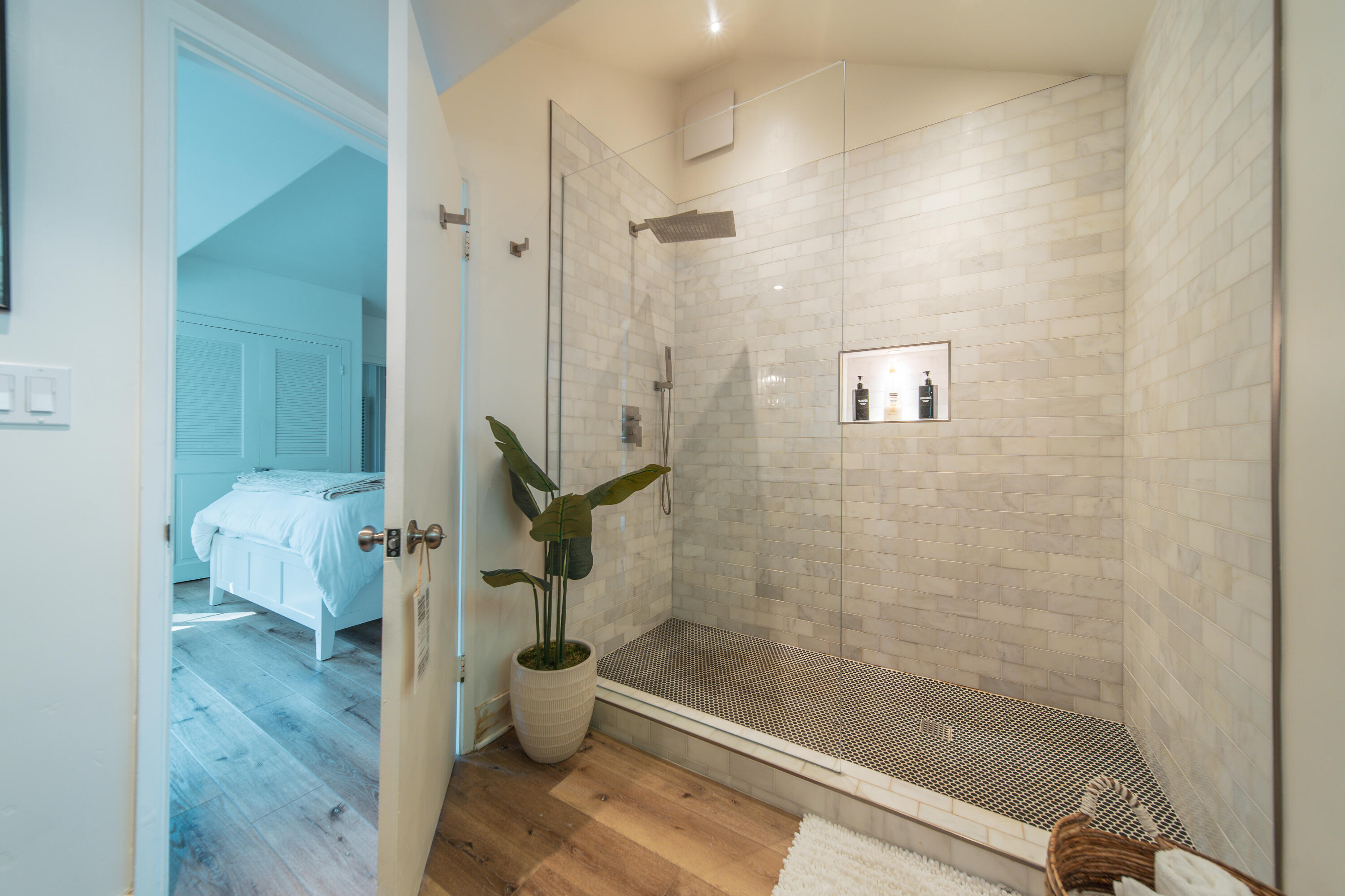 70 Eucalyptus Lane Santa Barbara, CA 93108 - Photo 2 of 47 a bathroom with a granite countertop shower