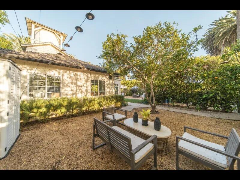 70 Eucalyptus Lane Santa Barbara, CA 93108 - Photo 44 of 47 a roof deck with table and chairs and potted plants