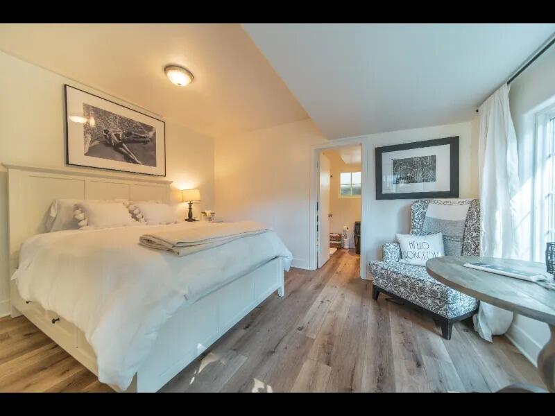 70 Eucalyptus Lane Santa Barbara, CA 93108 - Photo 6 of 47 a spacious bedroom with a bed and a couch