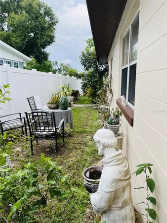 a bathroom with a sink vanity mirror and toilet