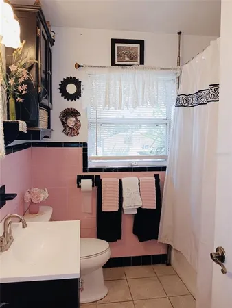 a kitchen with stainless steel appliances a stove a sink and a refrigerator