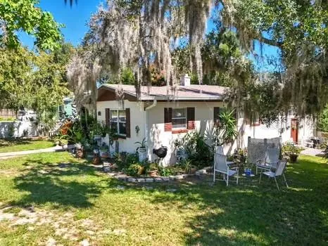 an aerial view of a house with a garden