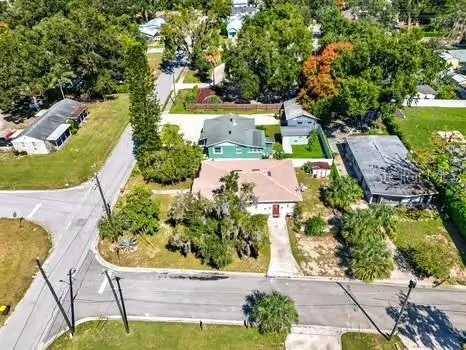 an aerial view of residential houses and outdoor space