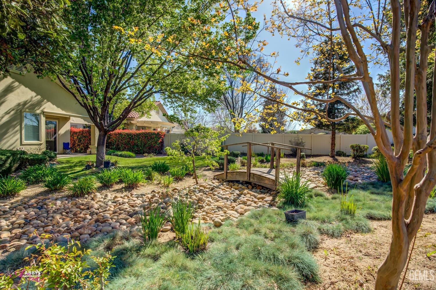 Undisclosed Address Bakersfield, CA 93306 - Photo 30 of 51 a view of a house with a yard