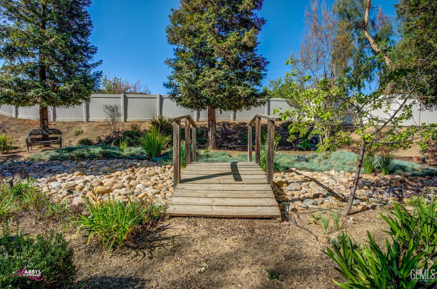 Undisclosed Address Bakersfield, CA 93306 - Photo 33 of 51 a view of a park with plants and trees