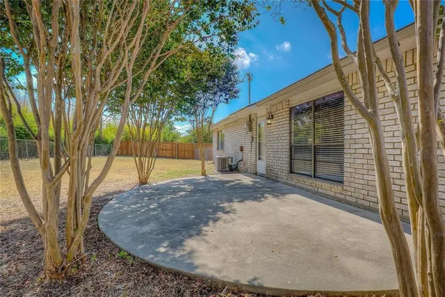 a room with a table and a sink