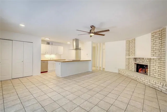 a view of a kitchen with furniture and a kitchen