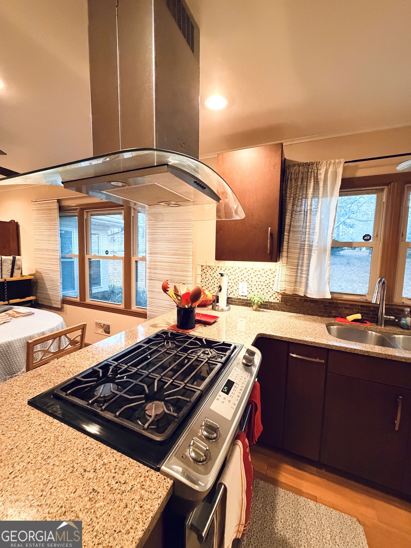 1701 Cedarwood Road Milledgeville, GA 31061 - Photo 12 of 40 a kitchen with a stove and a sink