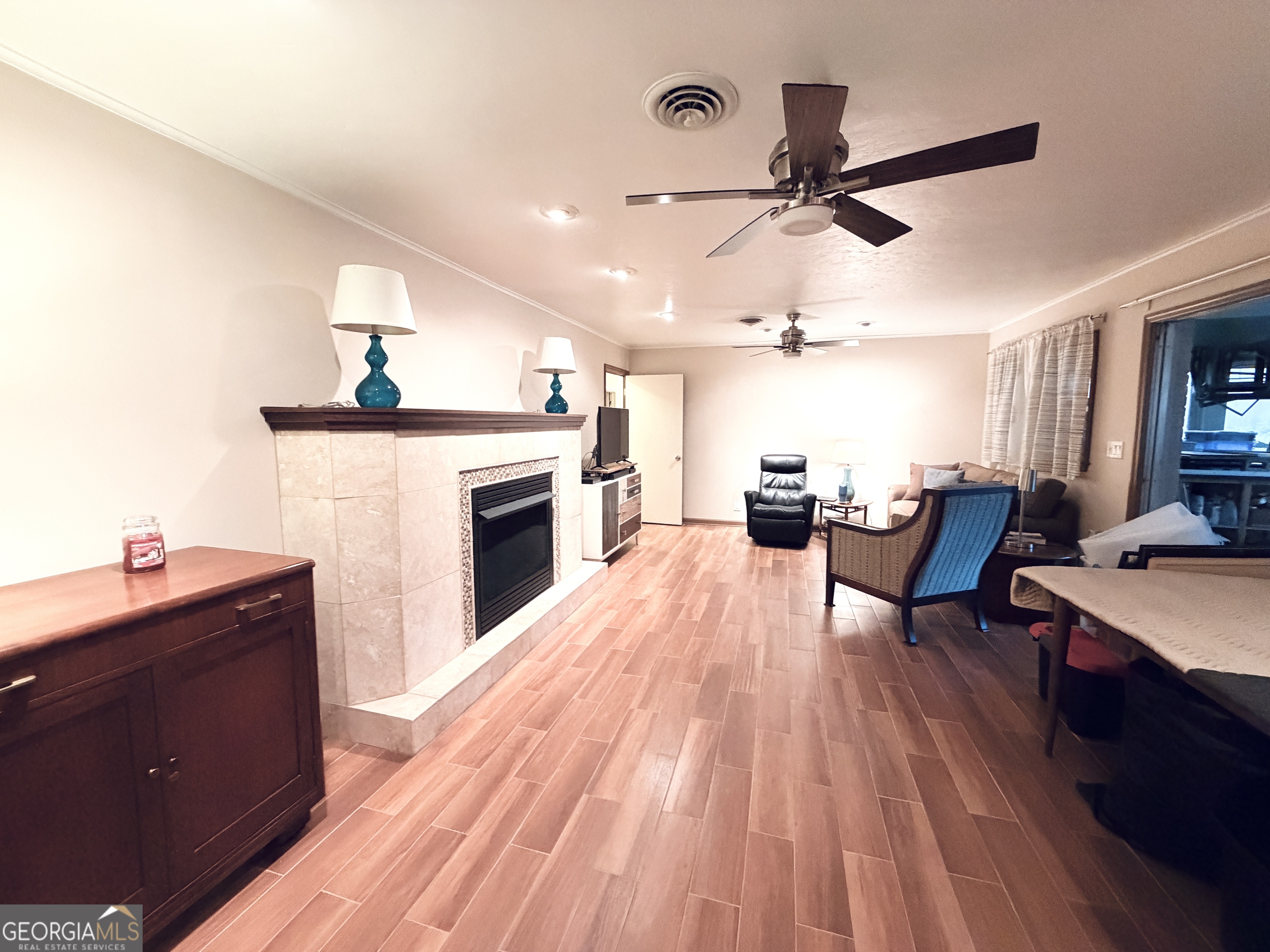 1701 Cedarwood Road Milledgeville, GA 31061 - Photo 15 of 40 a living room with furniture and fireplace