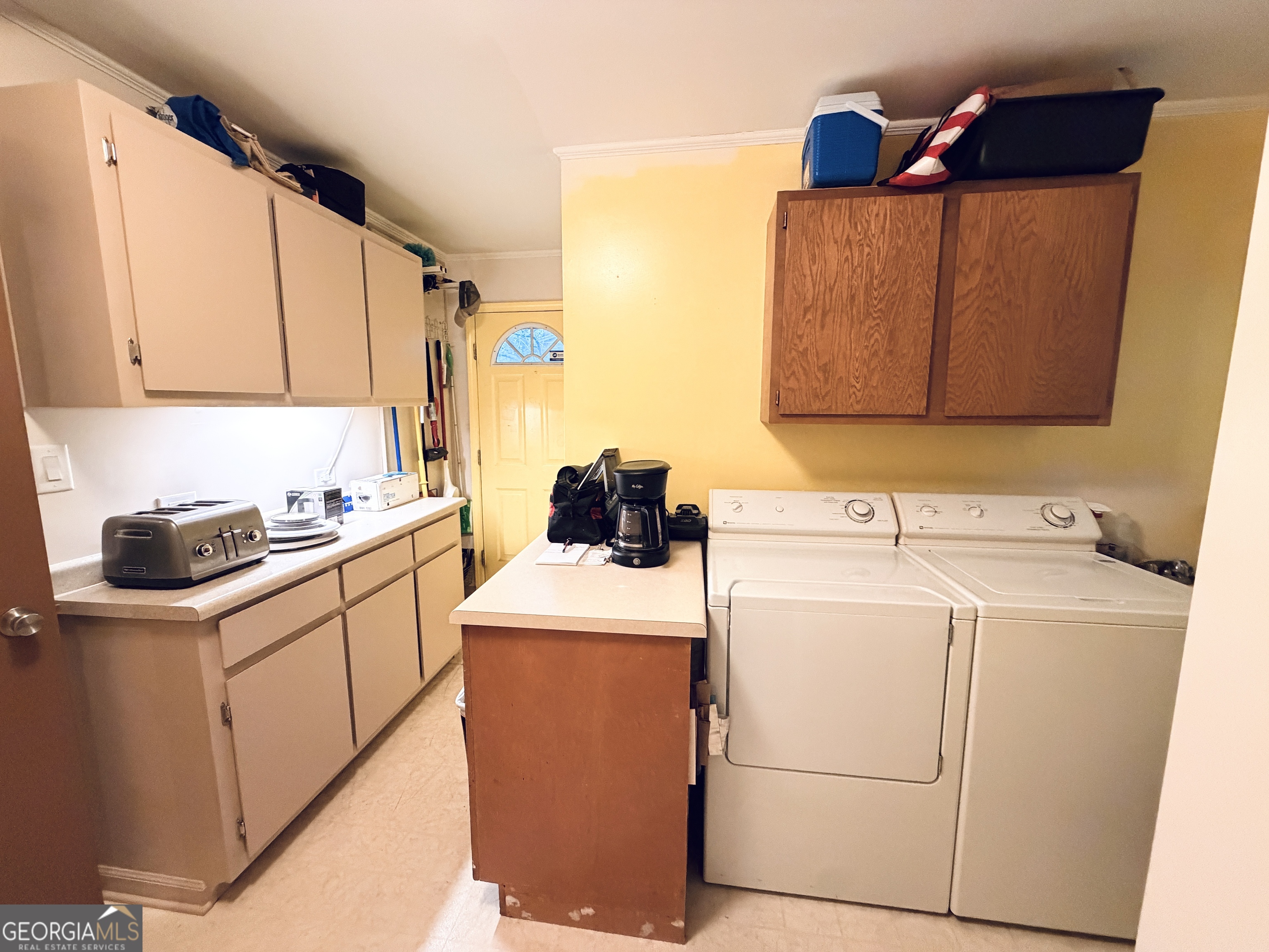 1701 Cedarwood Road Milledgeville, GA 31061 - Photo 33 of 40 a utility room with dryer and washer