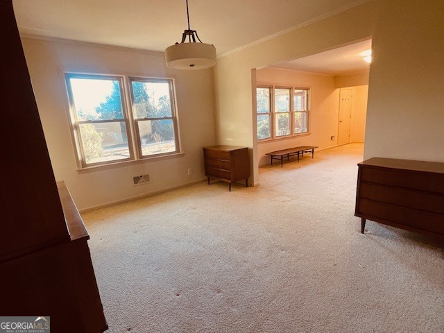 1701 Cedarwood Road Milledgeville, GA 31061 - Photo 38 of 40 an empty room with windows and ceiling fan