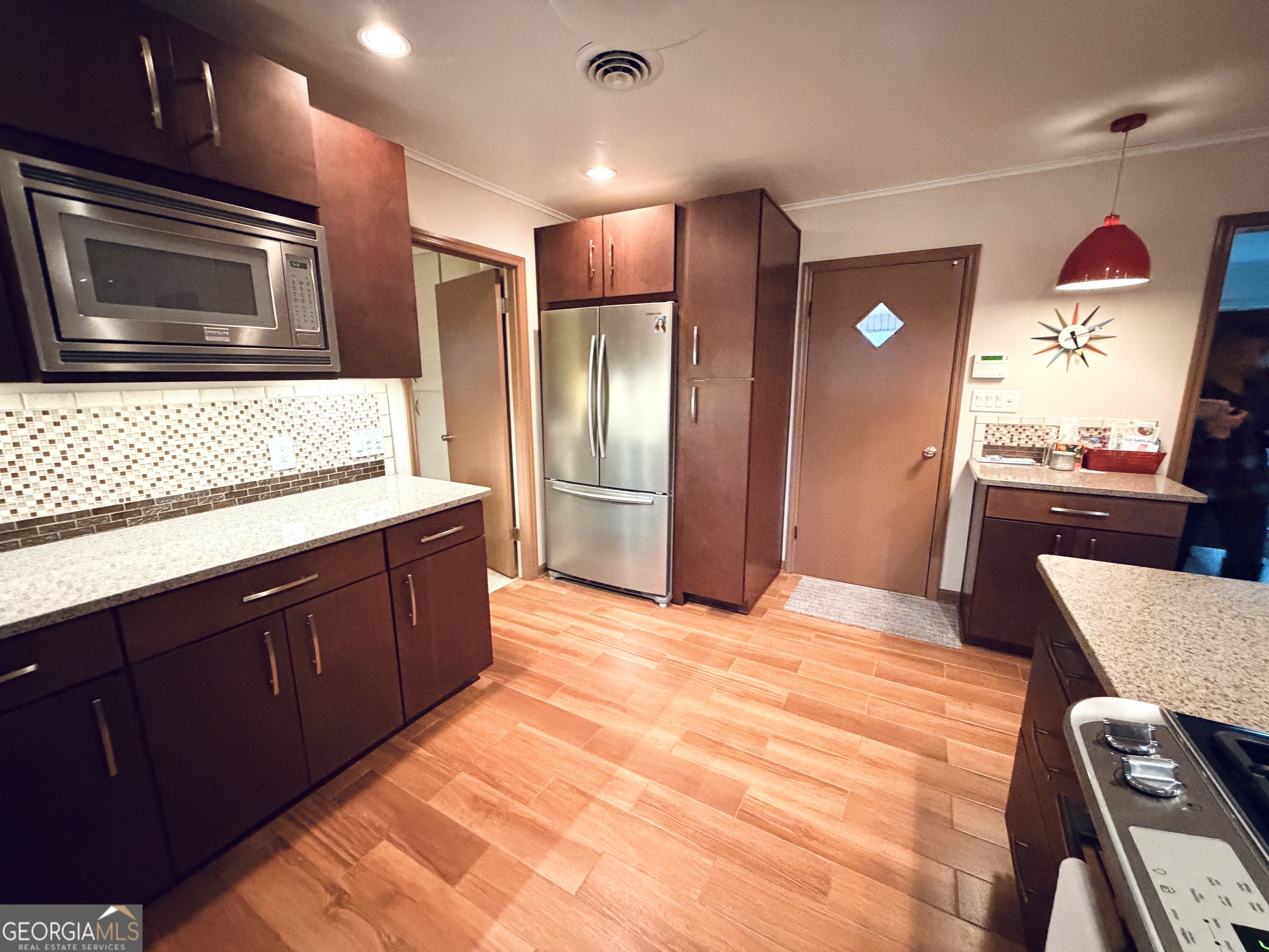 1701 Cedarwood Road Milledgeville, GA 31061 - Photo 9 of 40 a bathroom with a sink vanity and a mirror