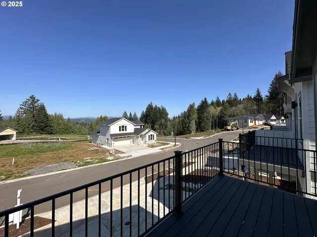 a view of a balcony with wooden floor