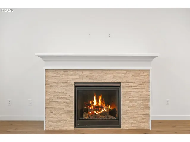 a living room with a fireplace