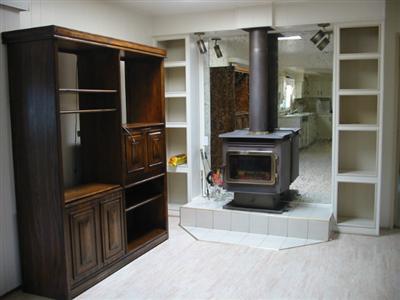 391 Bryce Canyon Road, Unit 391 San Rafael, CA 94903 - Photo 2 of 4 a living room with a fireplace and a walk in closet