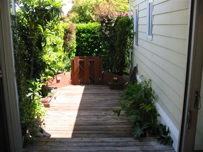 391 Bryce Canyon Road, Unit 391 San Rafael, CA 94903 - Photo 4 of 4 a view of a backyard with potted plants
