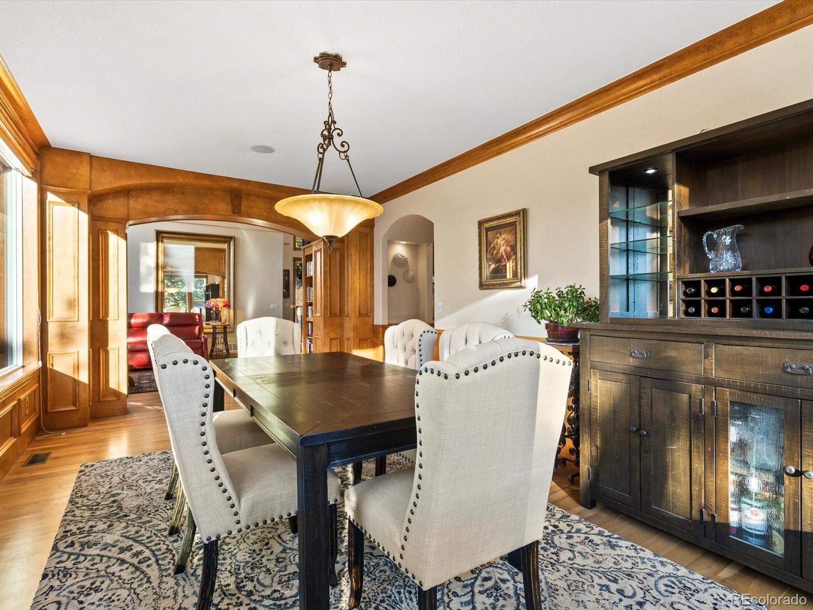 20906 Horse-Bit Way Morrison, CO 80465 - Photo 13 of 49 a dining room with furniture and window