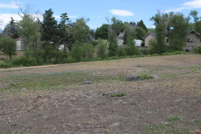 a view of beach and yard