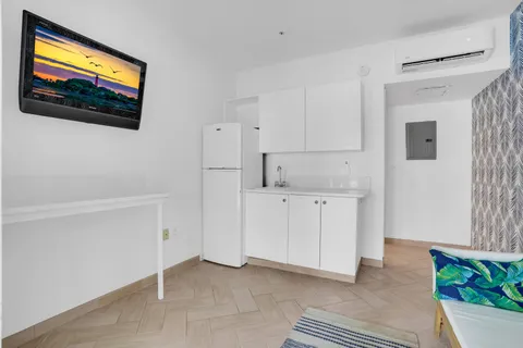 a view of kitchen with washer and dryer