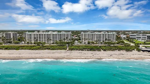 a view of a road with a building in the background