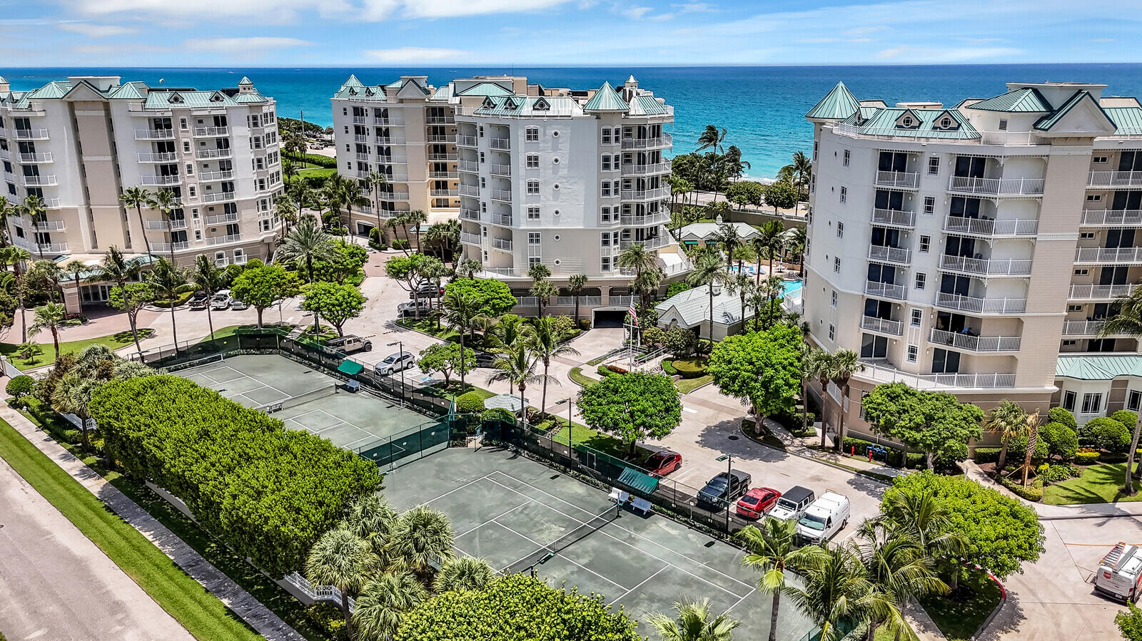 120 Ocean Grande Boulevard, Unit 2 Jupiter, FL 33477 - Photo 46 of 47 a view of a building with a garden