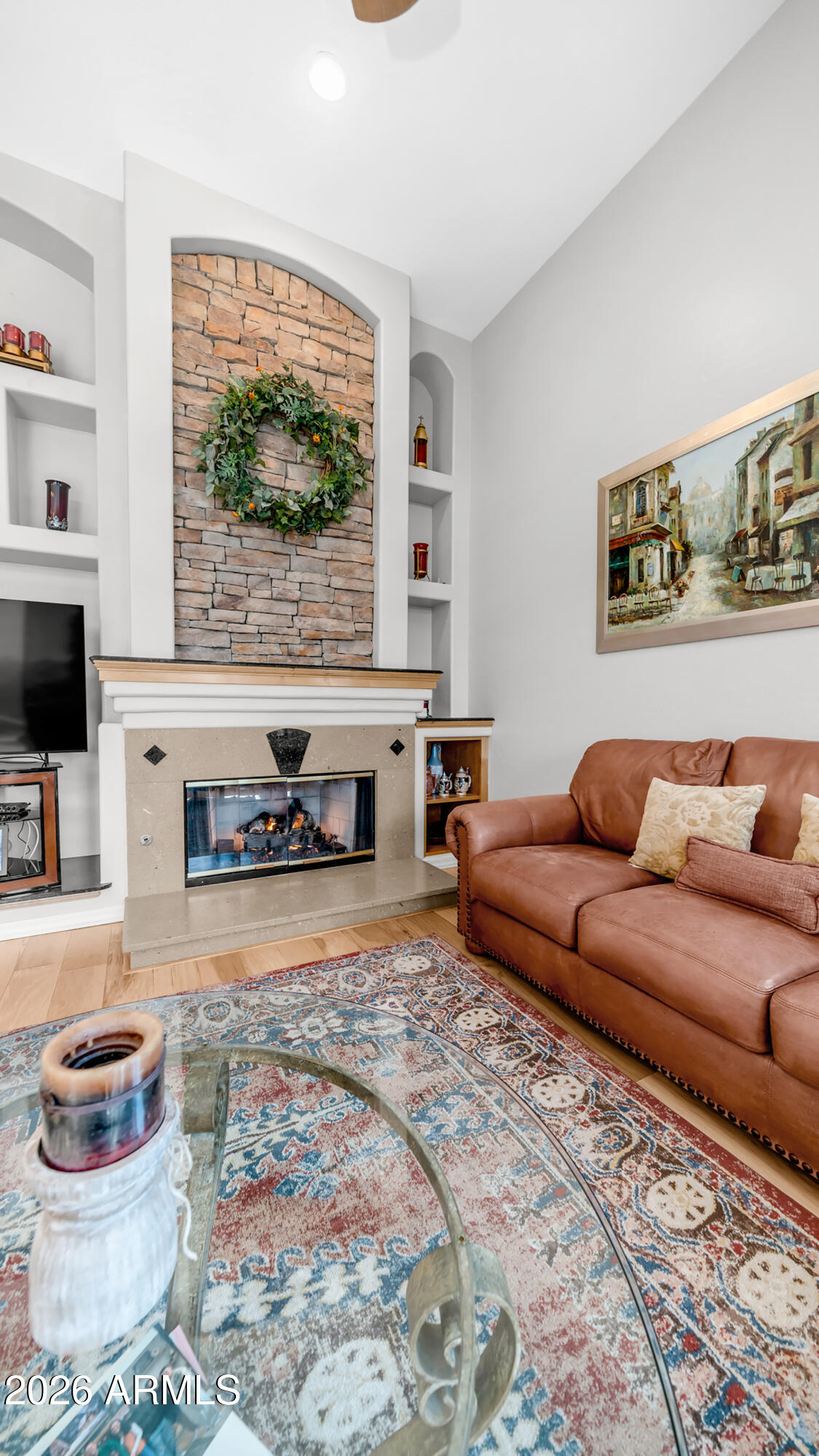 4055 North Recker Road, Unit 50 Mesa, AZ 85215 - Photo 26 of 77 a living room with furniture and a flat screen tv