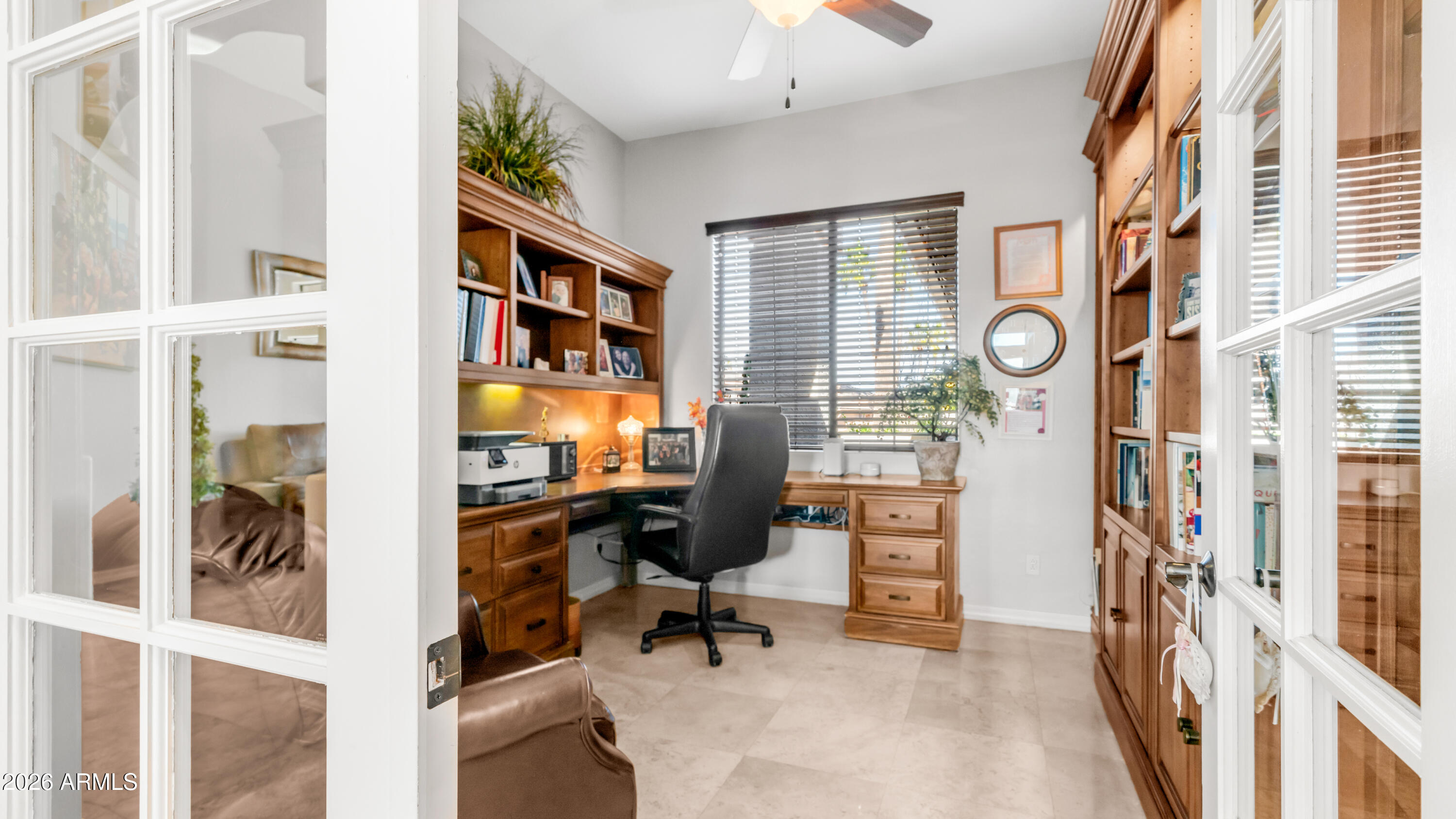 4055 North Recker Road, Unit 50 Mesa, AZ 85215 - Photo 28 of 77 a view of a workspace with furniture and a window