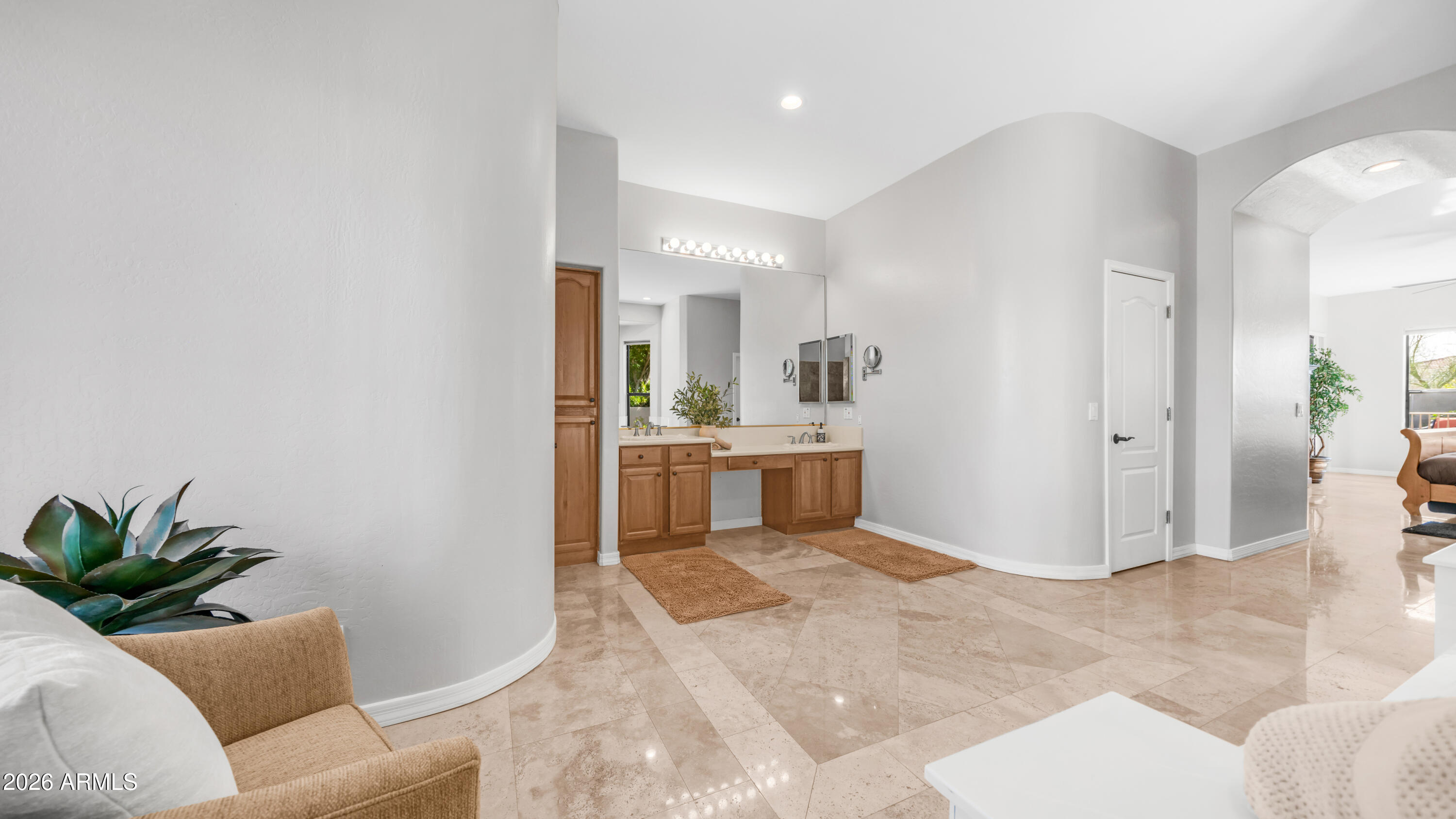 4055 North Recker Road, Unit 50 Mesa, AZ 85215 - Photo 37 of 77 a view of a livingroom with a kitchen and furniture