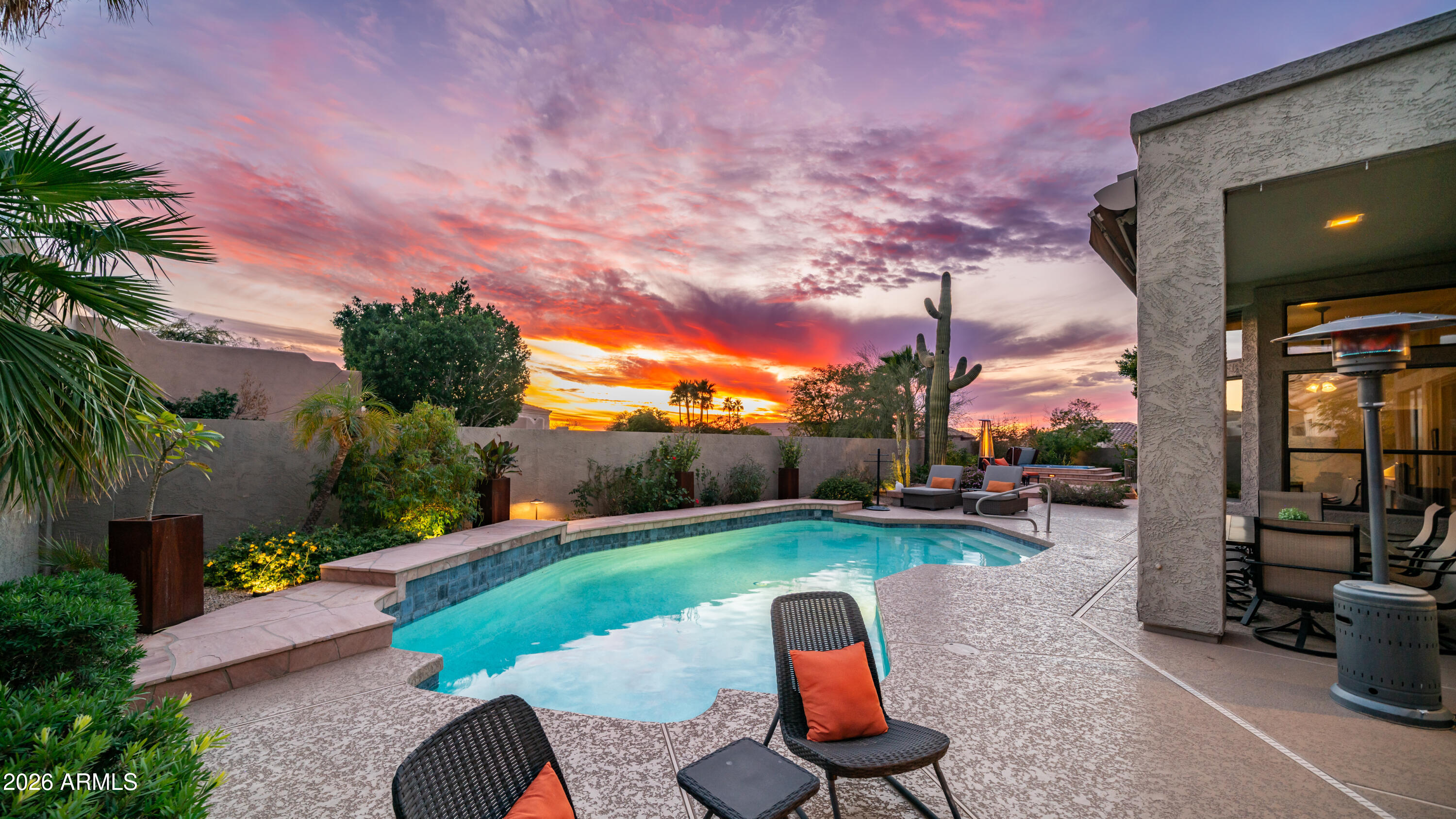 4055 North Recker Road, Unit 50 Mesa, AZ 85215 - Photo 55 of 77 a view of a backyard with sitting area and entertaining space