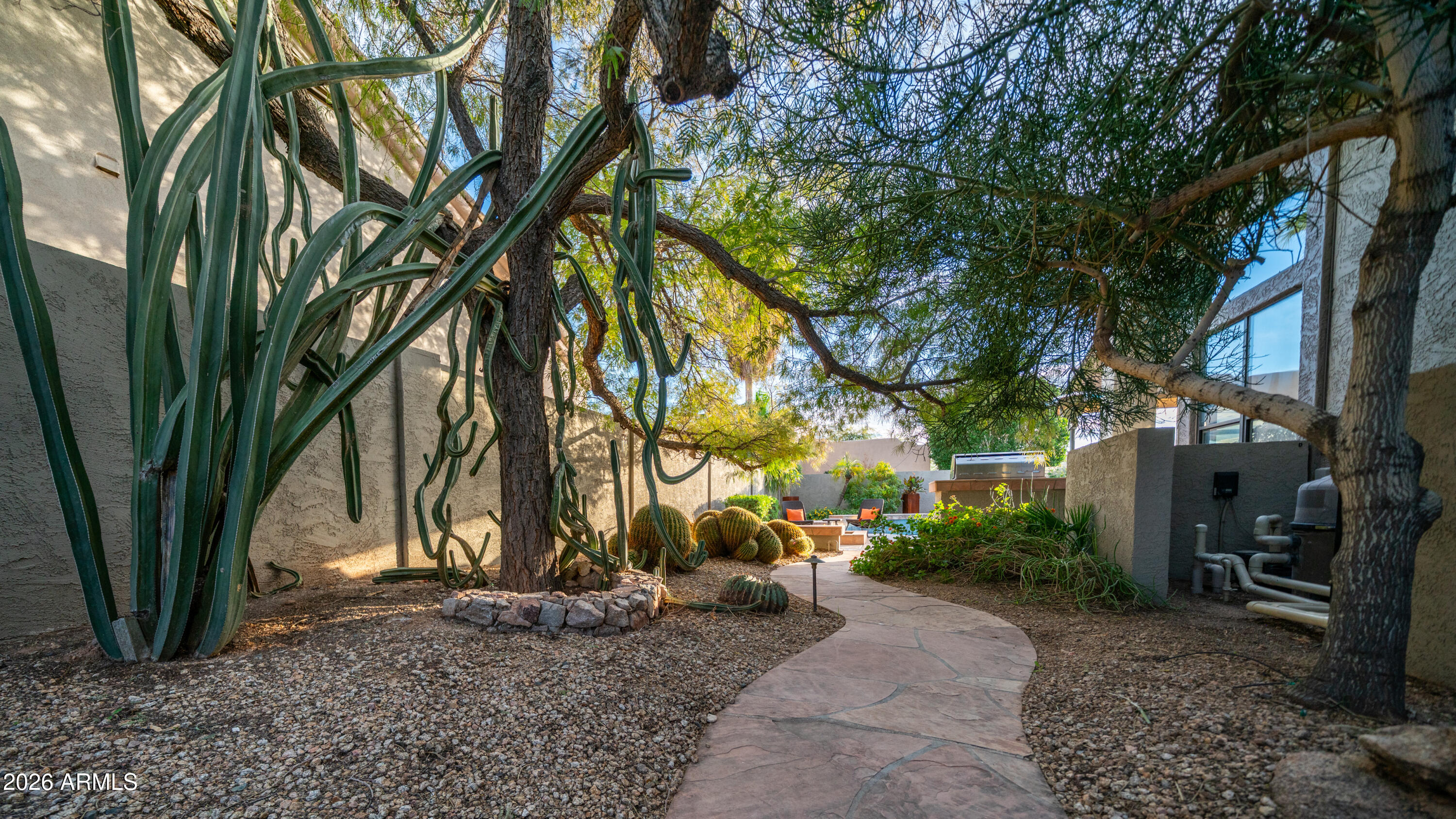 4055 North Recker Road, Unit 50 Mesa, AZ 85215 - Photo 64 of 77 a backyard of a house with lots of green space