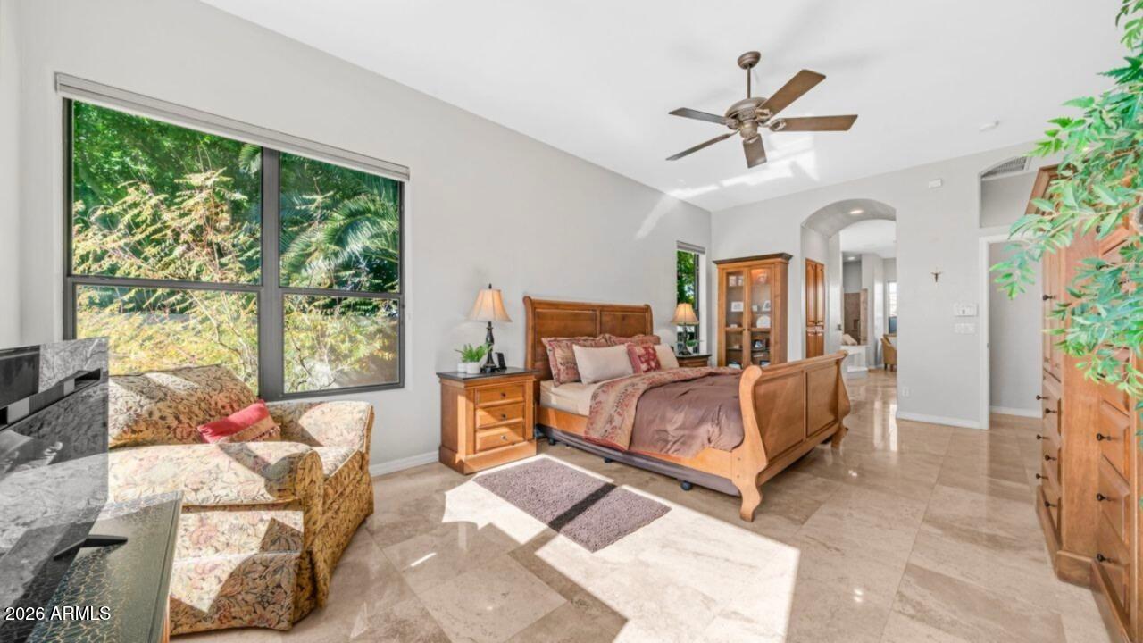 4055 North Recker Road, Unit 50 Mesa, AZ 85215 - Photo 9 of 77 a living room with furniture and a large window
