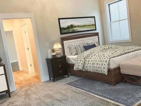 a workspace with furniture and a window