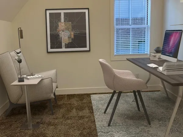 a living room with furniture and a painting on the wall