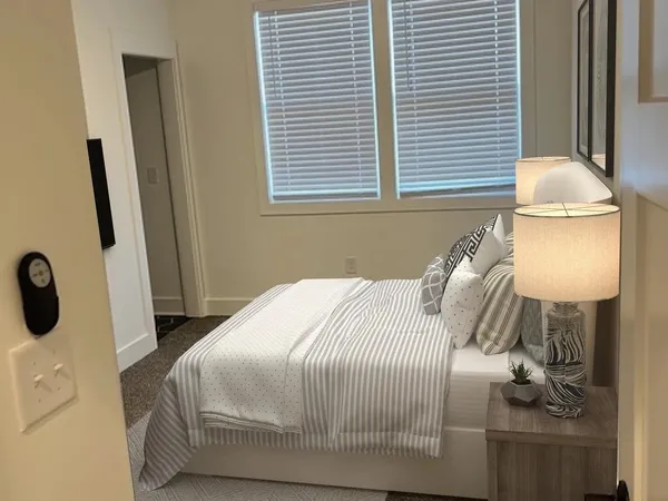 a bathroom with a glass door shower