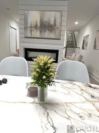 a kitchen with stainless steel appliances a refrigerator sink and stove