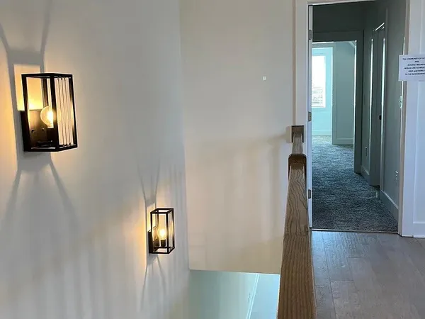 a bedroom with a bed and a television