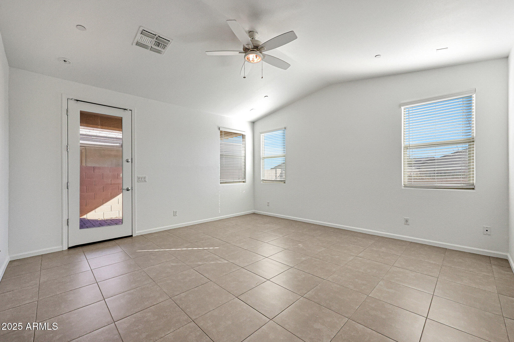 12429 West Midway Avenue Glendale, AZ 85307 - Photo 15 of 22 a view of an empty room with a window