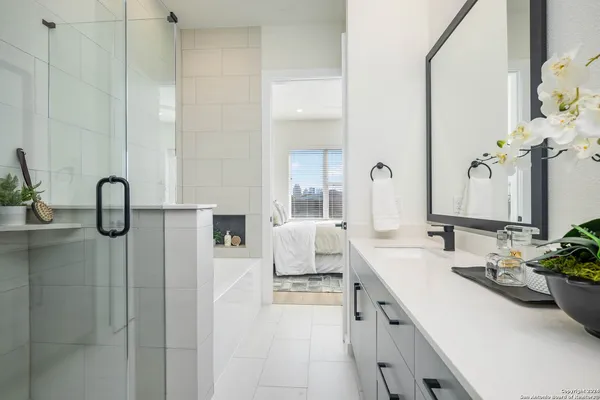 a bathroom with a sink and a mirror
