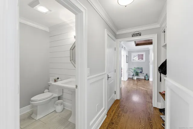 a bathroom with a toilet sink and a shower