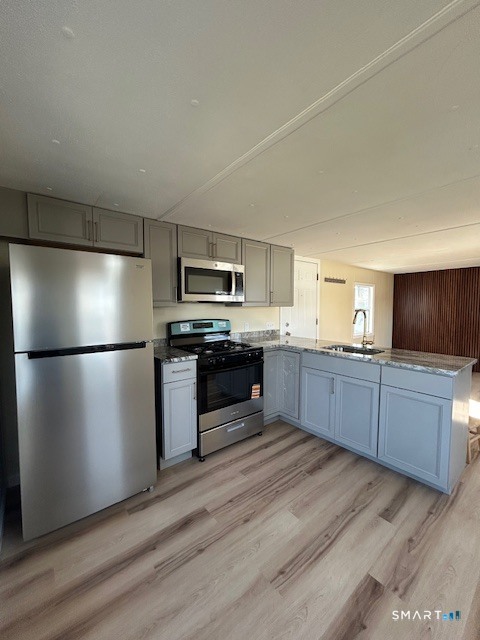 18 Fairway Drive Windham, CT 06256 - Photo 1 of 15 a kitchen with a refrigerator and a sink