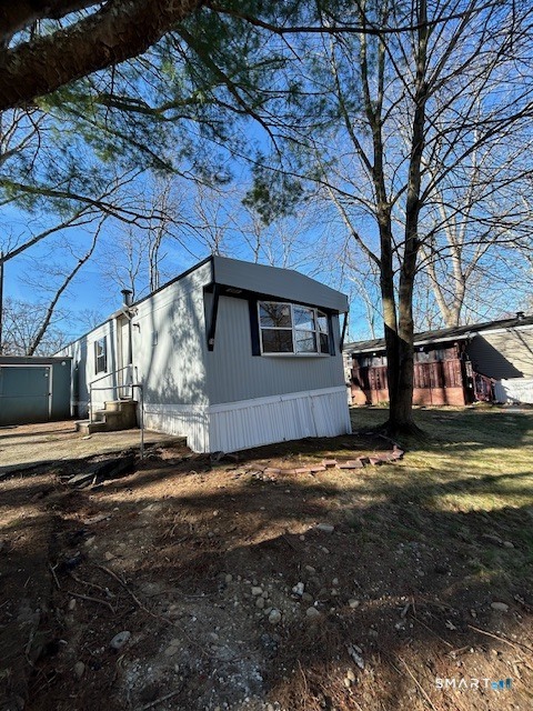 18 Fairway Drive Windham, CT 06256 - Photo 14 of 15 a view of a house with a yard
