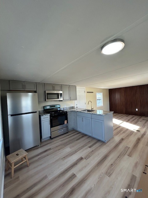 18 Fairway Drive Windham, CT 06256 - Photo 2 of 15 a kitchen with stainless steel appliances a refrigerator and a stove